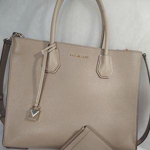 Gently used MK purse sold individually